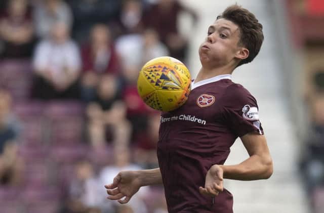 Young Hearts full-back Aaron Hickey has reportedly caught the eye of Manchester City. Picture: SNS