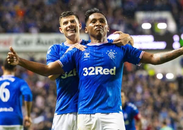 Joy for Alfredo Morelos as he celebrates the stoppage time goal that defeated Legia Warsaw at Ibrox in the Europa League play-off. Picture: SNS.