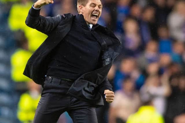 Steven Gerrard celebrates as Rangers make it to the Europa League.
