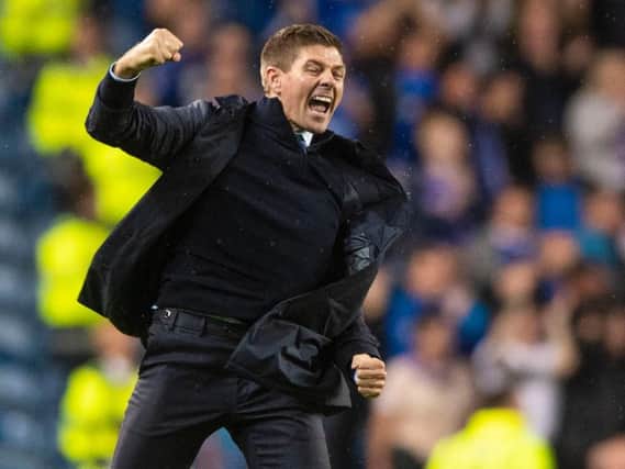 Steven Gerrard celebrates as Rangers make it to the Europa League.