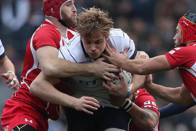 Richie Gray of Scotland is tackled by Beka Bitsadze of Georgia during the Autumn Test Match between Scotland and Georgia in November 2016 (Photo: Ian MacNicol/Getty Images)
