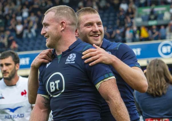 Scotland's Stuart Hogg, left, and Finn Russell after the 17-14 win over France. Picture: Bill Murray/SNS/SRU