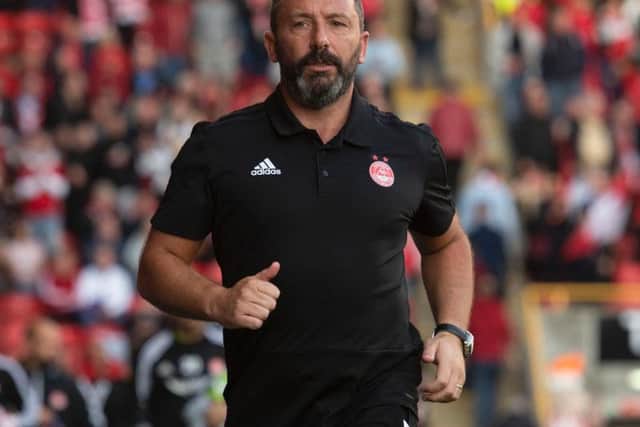 Derek McInnes is under pressure from Aberdeen fans. Picture: SNS