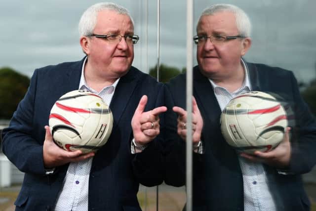 Tam Cowan, pictured at Pacific Quay in Glasgow, has been presenting football show Off The Ball on Radio Scotland for 25 years. Picture: John Devlin