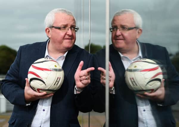 Tam Cowan, pictured at Pacific Quay in Glasgow, has been presenting football show Off The Ball on Radio Scotland for 25 years. Picture: John Devlin