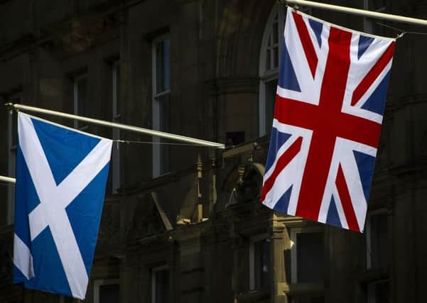 Flags have become divisive in Scotland, with the Saltire commandeered by nationalists. Picture: AFP/Getty