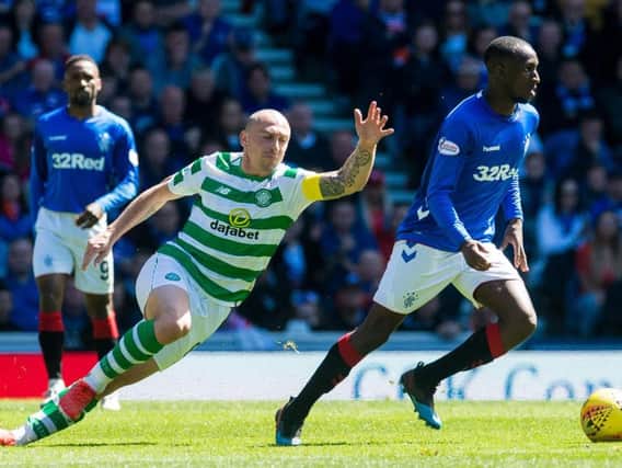 Rangers' Glen Kamara and Celtic's Scott Brown during a previous Old Firm clash.