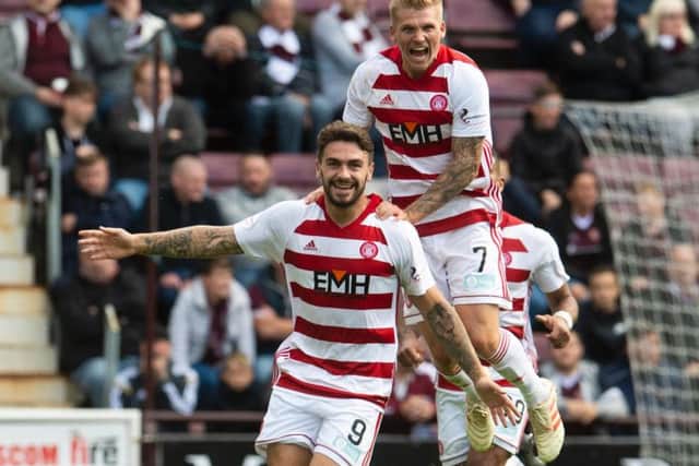 George Oakley celebrates his equaliser.