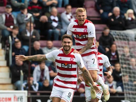 George Oakley celebrates his equaliser.
