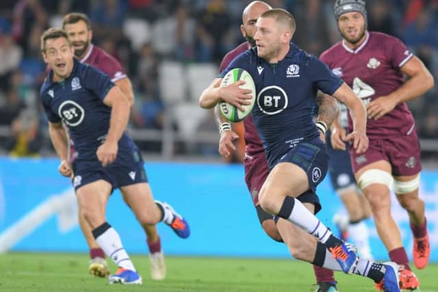 Finn Russell makes a break against Georgia. Picture: Levan Verdzeuli/Getty Images