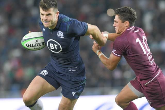 Blair Kinghorn goes past his man. Picture: Levan Verdzeuli/Getty Images