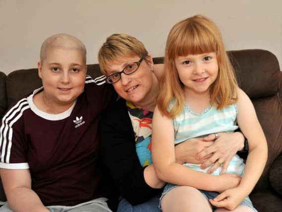Makaela Dancey has performed an adorable act of sisterly love by enduring painful surgery to help stop her sibling from suffering with the disease. Picture: SWNS