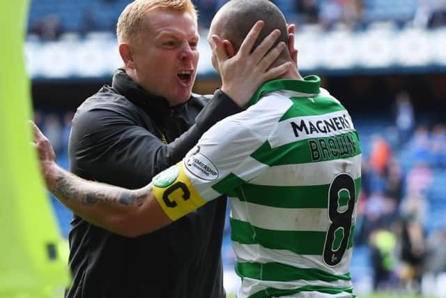 Neil Lennon celebrates with Scott Brown. Picture: Craig Williamson/SNS