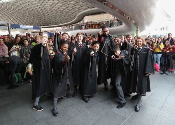Cast members from Harry Potter and the Cursed Child perform at London Kings Cross Station. Picture: Chris Radburn/PA Wire