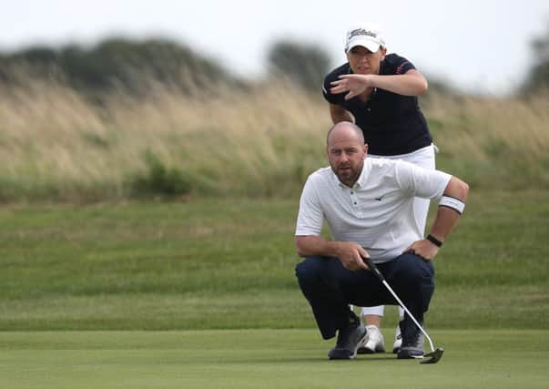 Heather MacRae made her return after surgery in the PGA Fourball at Farleigh with Craig Lee. Picture: Christopher Lee/Getty
