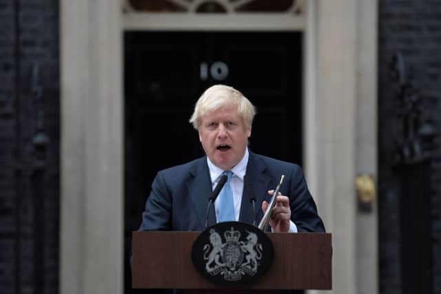 Boris Johnson makes a statement outside 10 Downing Street on Monday evening, as he pleaded with Tory rebels not to back a cross-party motion which could rule out no-deal Brexit. Picture: PA
