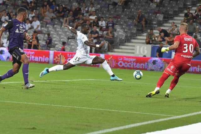 Moussa Konate in action for Amiens against Toulouse