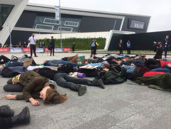 Around 40 activists from Extinction Rebellion participated in a die-in today at the front entrance of the P&J Live arena to protest the SPE Offshore Europe Conference & Exhibition, an oil and gas exploration and production conference hosting over 36,000 attendees from all over Europe. [1]

After reading a speech about the oil and gas industry's role in the climate and ecological crisis the activists lay down and pretended to die, representing those that have already died and will die in the future due to the climate and ecological emergency caused in part by burning fossil fuels.

Exploration of new oil and gas threatens to push the world over dangerous climate tipping points; even burning fossil fuels already extracted could lead to global heating of 6 degrees Celsius, with catastrophic consequences. [2]

Hannah, 23, student and XR activist said: Oil and gas companies have known about climate change for over thirty years now and actively lobby to block climate change policies. Meanwhile, people are already