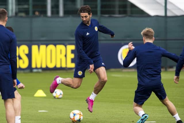Charlie Mulgrew is likely to line up alongside debutant Liam Cooper against Russia on Friday evening. Picture: SNS.