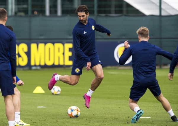 Charlie Mulgrew is likely to line up alongside debutant Liam Cooper against Russia on Friday evening. Picture: SNS.