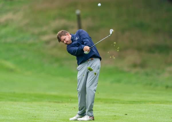 Paul OHara plays his approach shot at the fourth in the first round of the Scottish PGA Championship. Picture: Kenny Smith