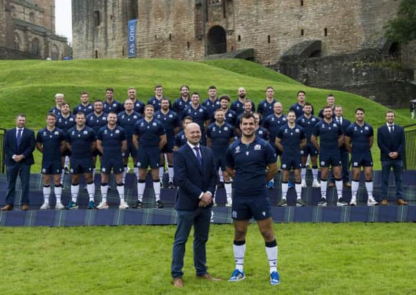 Head coach Gregor Townsend, captain Stuart McInally and the rest of the Scotland players after the World Cup squad was announced at Linlithgow Palace yesterday. Picture: Ian Rutherford/PA