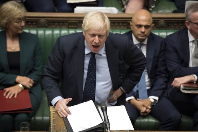 Boris Johnson speaks in the House of Commons.  (Jessica Taylor/House of Commons via AP)
