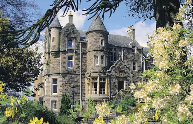 Baronial revival Knock Castle in Crieff, Perthshire has the feel of a small scale stately home