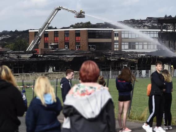 The fire devastated Woodmill High School ten days ago.