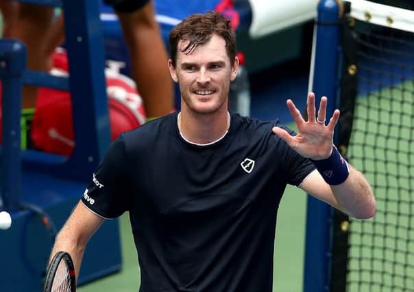 Jamie Murray celebrates his win in the men's doubles quarter-finals. Picture: Clive Brunskill/Getty Images