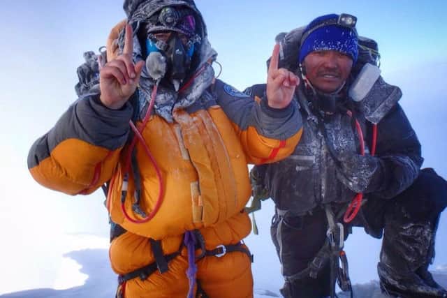 Mollie Hughes with Lhakpa Wongchu Sherpa on the summit of Mount Everest. Picture: Mollie Hughes