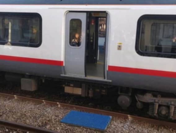 The Rail Accidents Investigation Branch (RAIB) released a photo of the door which remained open while the train travelled at around 80mph. Picture: Tim Neobald/RAIB/PA Wire