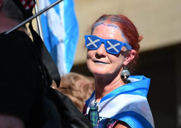 A Yes supporter on an independence rally. Pic: John Devlin