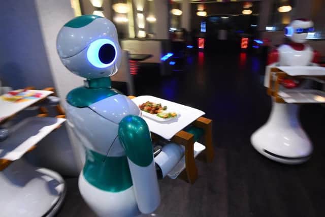 Patrons in this restaurant in Kathmandu, Nepal, are served food by robots. Picture: AFP