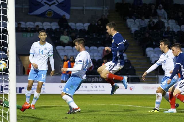 Glenn Middleton, right, scores Scotland U21s' second goal against San Marino. Picture: SNS