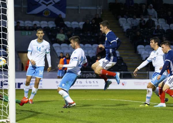 Glenn Middleton, right, scores Scotland U21s' second goal against San Marino. Picture: SNS