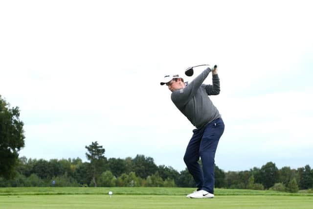 Bob MacIntyre tees off on the fourth during the first round of the Porsche European Open. Picture: Matthew Lewis/Getty Images