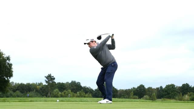 Bob MacIntyre tees off on the fourth during the first round of the Porsche European Open. Picture: Matthew Lewis/Getty Images