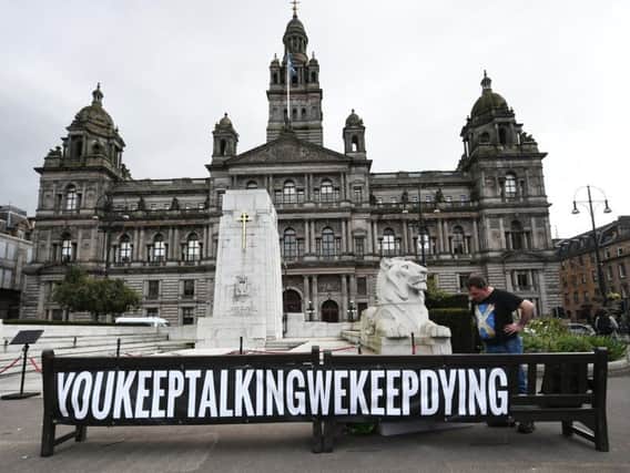 A vigil for relatives and friends of those who have died drug-related deaths was held in Glasgow's George Square last week. Picture: John Devlin