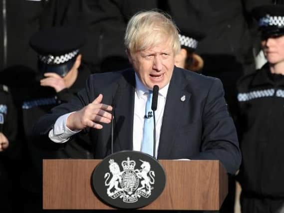 Prime Minister Boris Johnson speaking in front of police cadets in Wakefield