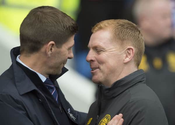 Steven Gerrard and Neil Lennon share a smile at Ibrox but it was the Celtic manager who had the last laugh. Picture: Ian Rutherford/PA