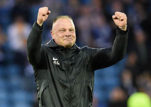 Connah's Quay's Scottish manager Andy Morrison celebrates at full-time after his side knocked Kilmarnock out of the Europa League. Picture: Ross Macdonald/SNS