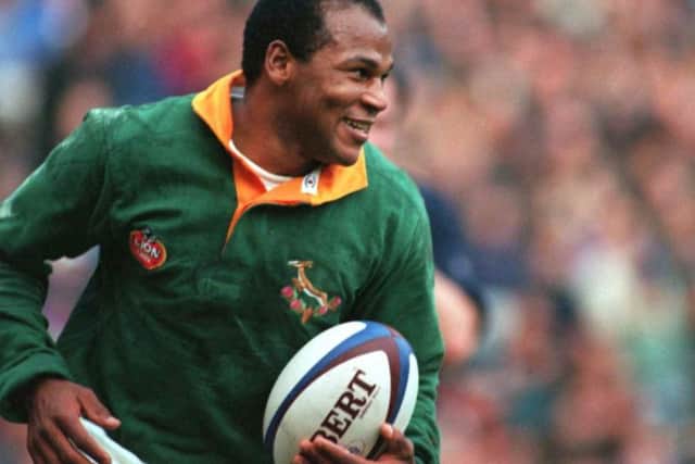 Chester Williams celebrates after crossing the whitewash against Scotland at Murrayfield in 1994