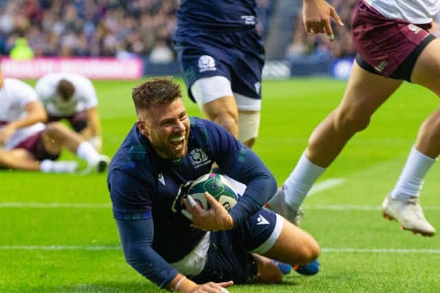 Ali Price is all smiles as he crosses the whitewash for the first try