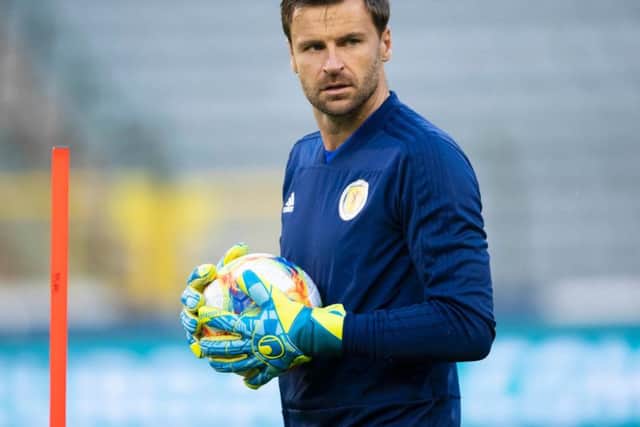 Shot-stopper could do nothing about either goal but pulled off a string of fine saves to keep the scoreline down. Can be pleased with his display.
