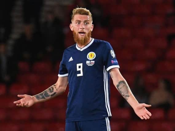 Oli McBurnie reacts during the 2-1 defeat to Russia at Hampden