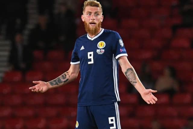 Scotland's Oli McBurnie worked hard against Russia. Picture: SNS