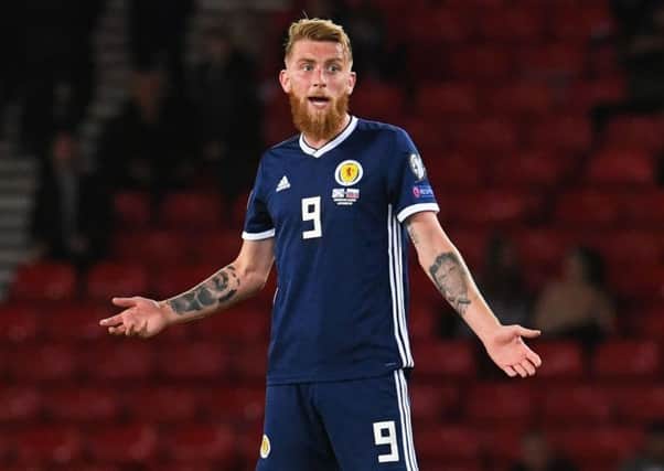 Scotland's Oli McBurnie worked hard against Russia. Picture: SNS