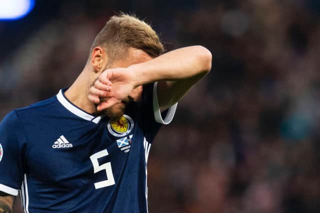 Liam Cooper during the defeat to Russia