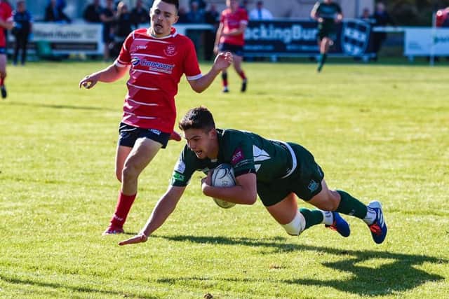 Bailey Donaldson crosses the line for Hawicks sixth try 15 minutes from the end. Photograph: Paul Devlin/SNS Group/SRU